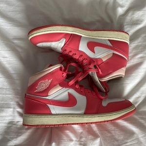 Pink Jordan 1s mid